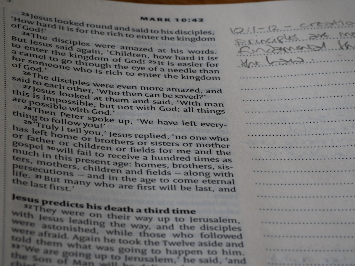 a close up of a book with writing on it