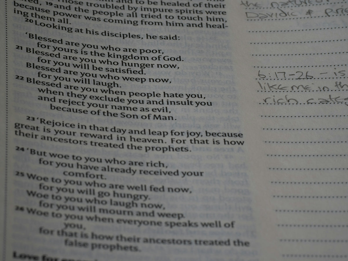 A close up of a book with writing on it