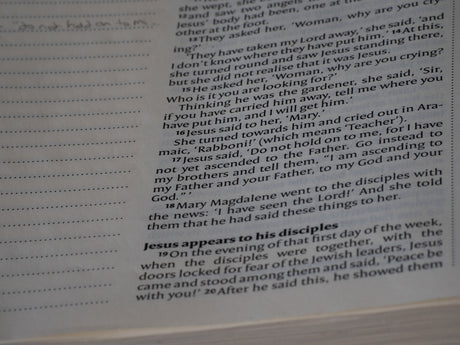 A close up of a book with writing on it
