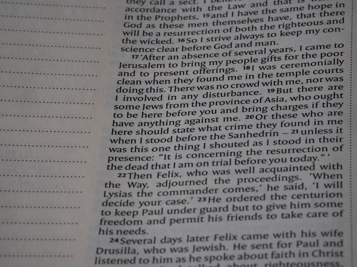 A close up of a book with a page in it
