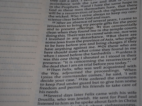 A close up of a book with a page in it