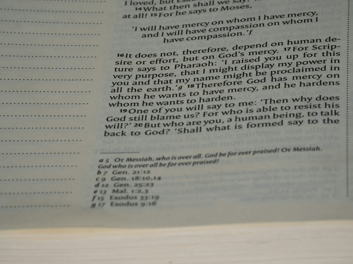 A close up of an open book with text