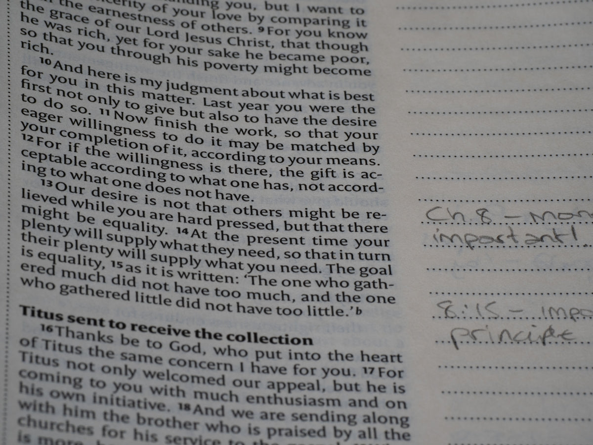 A close up of a book with writing on it